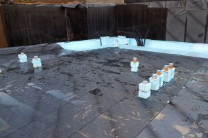 A layer of waterproofing material goes on next; water and waste pipes are insulated to avoid thermal bridging (one of many ways heat can escape a building).