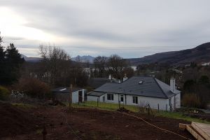 And this is the view we'll enjoy from the main living area - all the way across Portree Bay to the distant Cuillins.