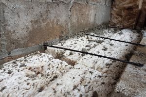 Here's an example of how filthy the insulation can get if not protected: mortar 'snots' and general building dirt and dust, plus over-exposure to the elements, can lead to the insulation failing. This needs to be thoroughly vacuumed off, mortar 'snots' removed, gaps filled and, in some cases, replaced or reinserted correctly.