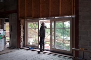 A sliding door in each window section will open onto the balcony - yet to be constructed. The internal wooden frames are pine, treated with an oil containing a small amount of white pigment, which will stop them turning yellow with age.