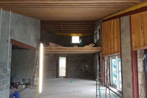 Inside the house, the upper floor has been cleared ready for the concrete floor screed to be poured.