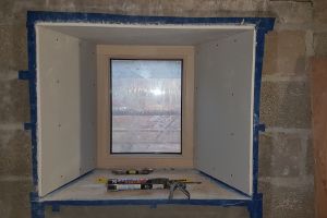 And here's the window just before the wall is plastered. The plasterboard has been installed on top of the OSB. Only the sill has been left - this is possibly going to be slate or timber. Discussions are ongoing...