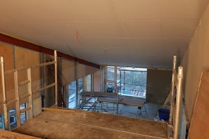 And at the end of the day, this is the finished ceiling looking down from the mezzanine. The plasterboard changes the whole look and feel of the room.