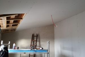 This ceiling was going to be flat, but we asked for it to be left sloping to add a bit of height and interest.