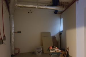 And, finally, the utility/plant room. This is the utility end of the room. A countertop with a sink unit will be built against the end wall, with storage cupboards and the washing machine.